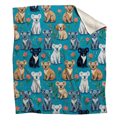 Koalas et couvertures à motif de fleurs