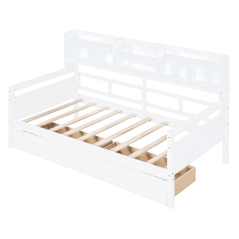 Lit de jour simple avec finition blanche, tablettes de chevet, support en lattes de bois et deux tiroirs sous le lit confortables en blanc, qui répondent aux différents besoins de votre espace