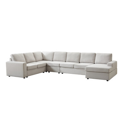 Large  Scale L  Shaped Modular Sofa Set With Detachable Components, Comfortable Upholstery And Decorative Throws For Contemporary Home Interiors