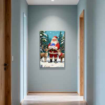 Père Noël tenant une boule à neige avec renne