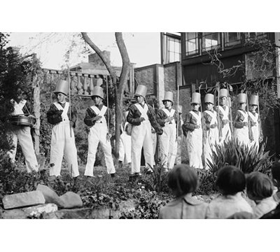 Line Of Boys Pose As Soldiers With Inverted Pails On Their Heads - Photograph