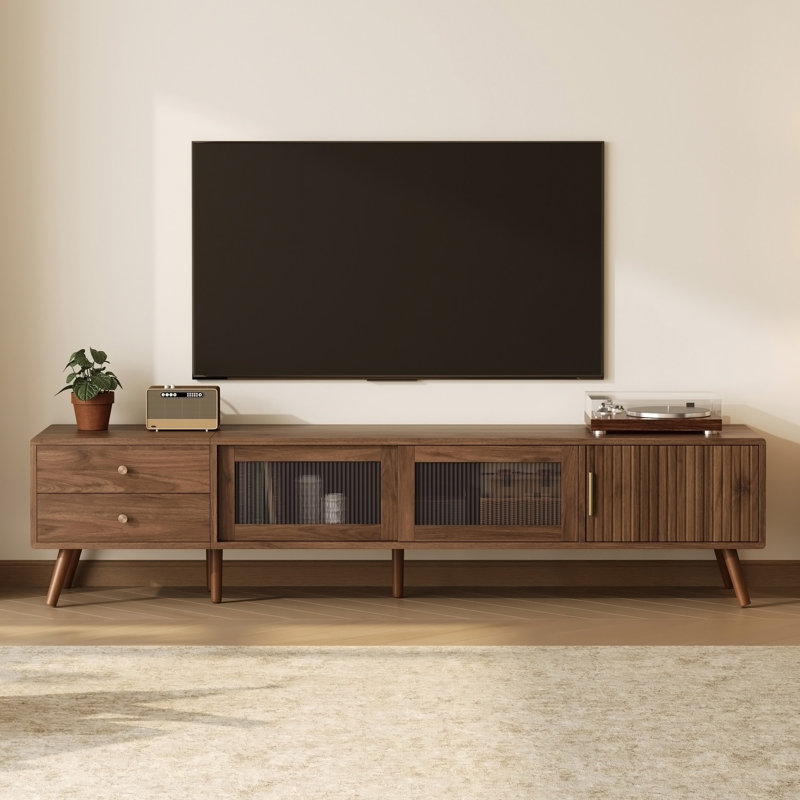 Meuble télé moderne et minimaliste de 76 pouces avec portes vitrées, compatible avec les téléviseurs jusqu'à 85 pouces.