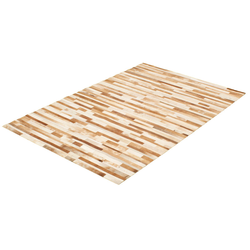 Avnee Cowhide Abstract Indoor Rug