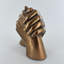 Tergel Holding Hands Anniversary Sculpture