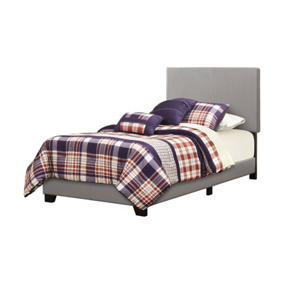 Lit simple gris en similicuir avec un panneau et un support de matelas confortable et élégant pour la chambre à coucher