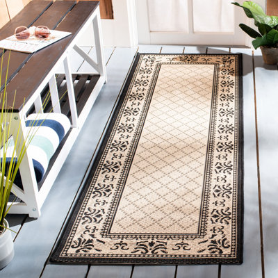Tapis intérieur / extérieur brun clair / noir Arneshia