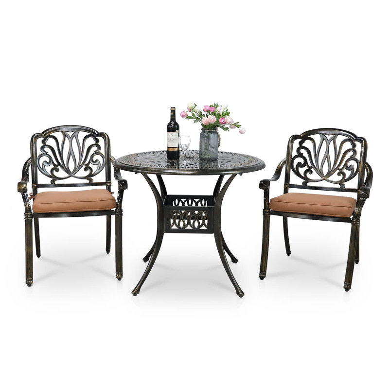 Deshira 2 - Person Patio Dining Set with Round Table , Cushions Included