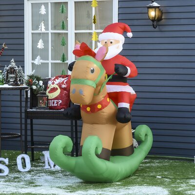 The Holiday Aisle® Santa Claus Riding Rocking Horse Christmas ...