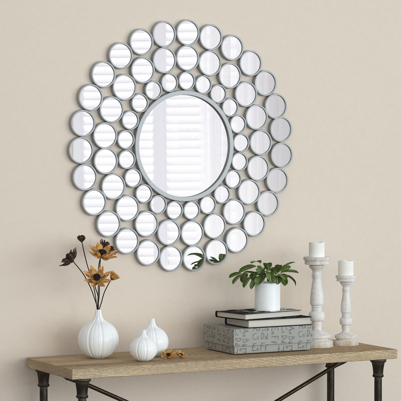 Miroir mural en métal argenté