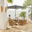 Dubose 4 - Person Wicker Patio Dining Set with Round Table , Cushions Included-1303167531