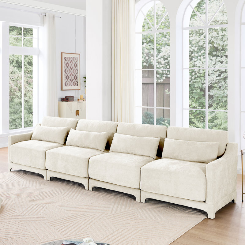 Chenille beige à quatre places avec caractéristiques ergonomiques et coussin lombaire, structure en bois massif, éponge, capitonnage exquis, confortable, convient à divers espaces de vie