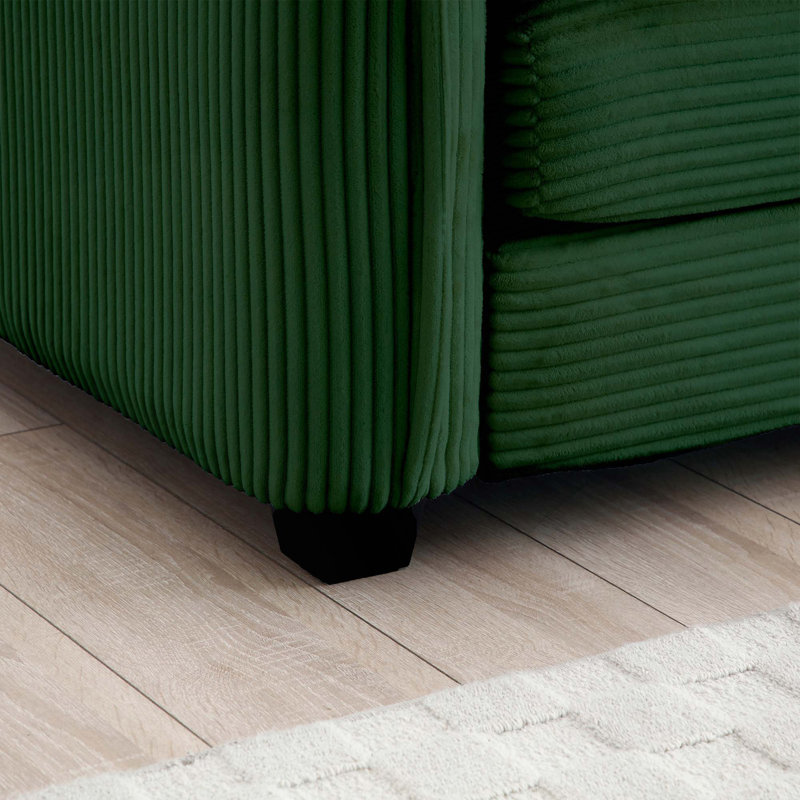 Canapé simple à assise profonde avec repose-pieds et coussin, salon
