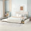 Grand lit plateforme tapissier avec lit gigogne simple et deux tiroirs