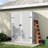 Versatile Outdoor 48 in. W x 21 in. D Resin Tool Shed With Shelf