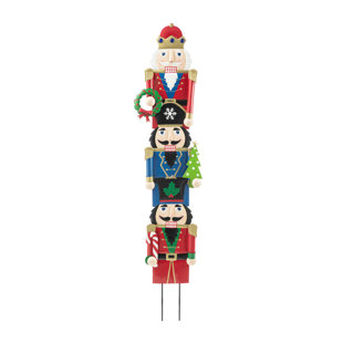 https://assets.wfcdn.com/im/78326925/resize-h310-w310%5Ecompr-r85/2467/246731902/jyrin-3-piece-nutcracker-garden-stake-set.jpg