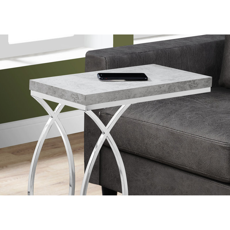 La table d'appoint contemporaine de couleur grise apporte une touche d'élégance à votre espace
