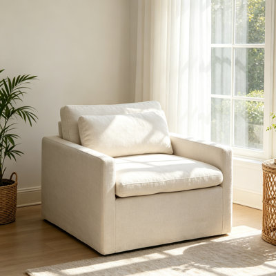 Fauteuil d'appoint recouvert de tissu ivoire