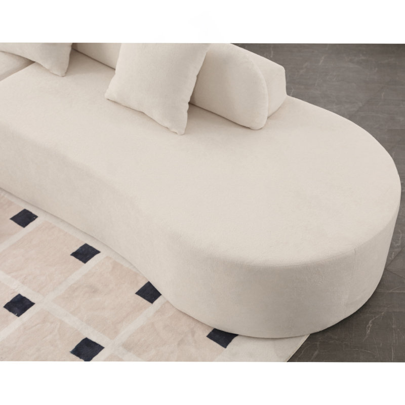 Canapé combiné moderne et incurvé avec une conception ergonomique pour un confort et un soutien inégalés, parfaits pour la détente et le divertissement.