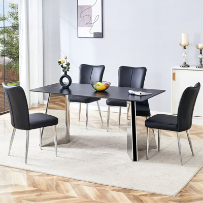 Table de salle à manger en marbre noir minimaliste et 4 chaises en polyuréthane avec structure stable