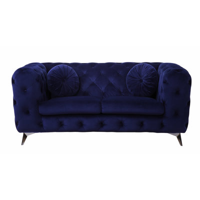 Causeuse en velours bleu