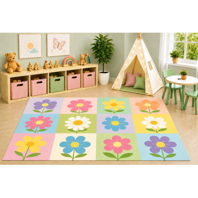 Tapis ultra-léger 152 x 213 cm à motif floral pastel, patchwork de marguerites colorées, idéal pour la chambre d'enfant, la crèche ou la salle de jeux. Dos en silicone antidérapant.