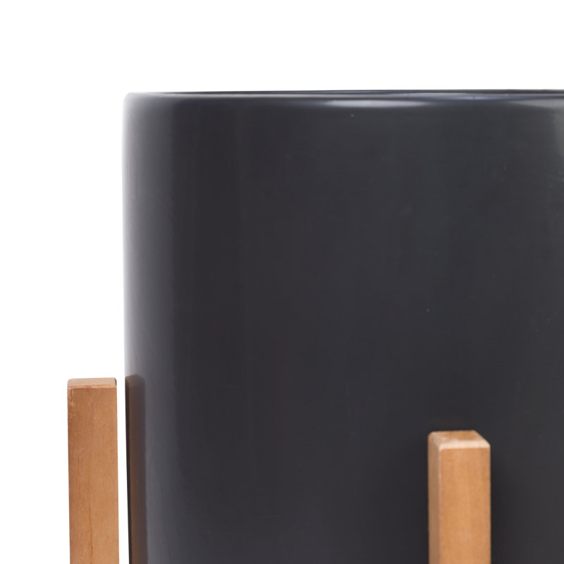 Surles Round Modern Ceramic Indoor Pot Planter with Wood Legs, Black, 16" H x 11" W x 11" D