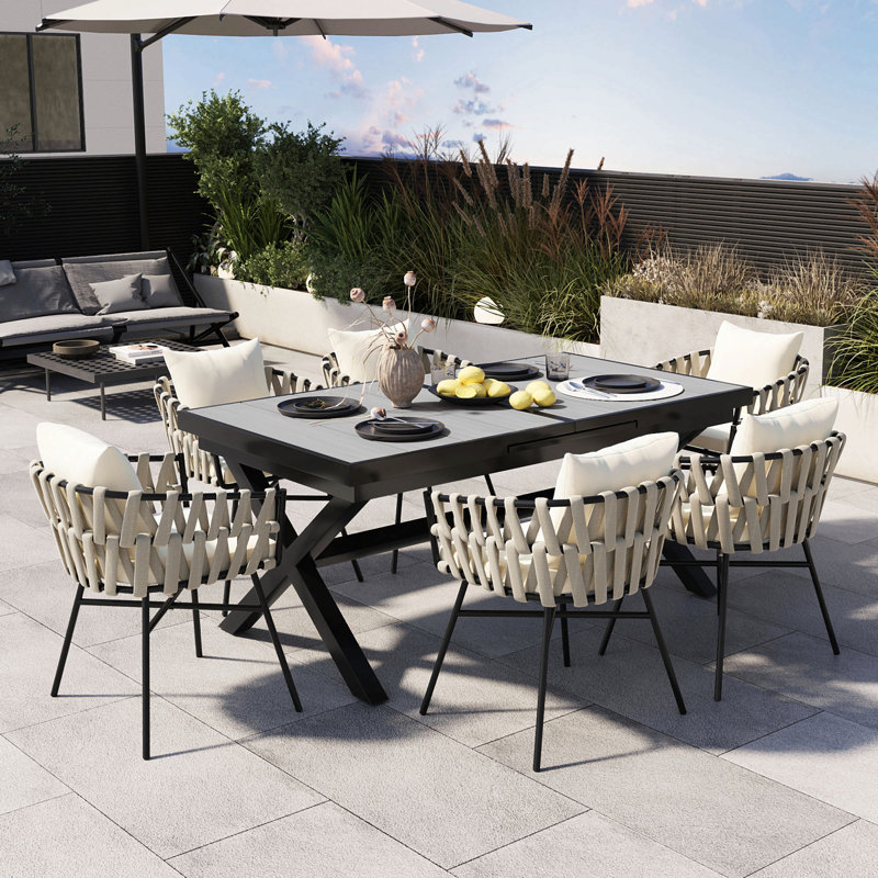 Discover Unmatched Flexibility In Alfresco Dining With Six Creatively Arranged Chairs Made Of Polyester Woven Tape And A Table That Expands From 62.9 To 82.6 Inches To Suit Any Occasion.