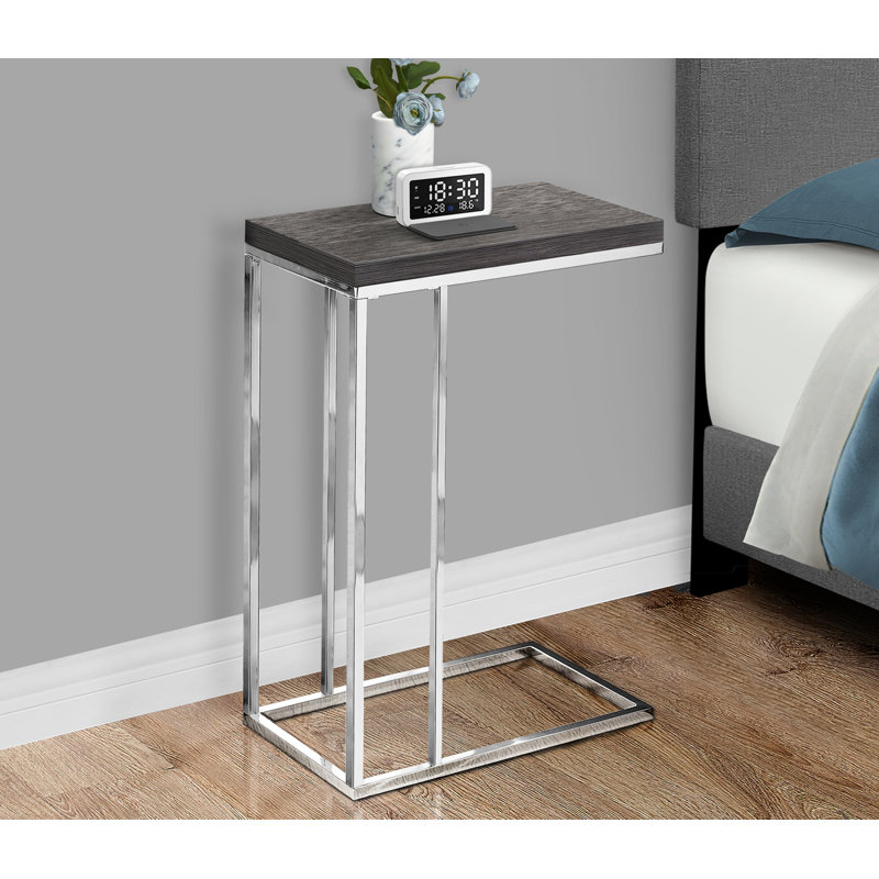 Table d'appoint en forme de C avec plateau en stratifié gris et structure en métal noir, parfaite pour les espaces de vie modernes