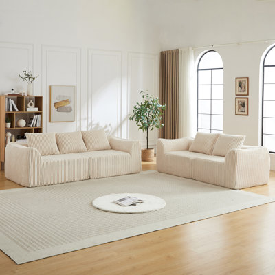 Ensemble de canapé Minimalist 3 + 2 places en velours côtelé avec lignes courbes et dossier légèrement incliné, livré avec 5 coussins décoratifs en forme de corne beige