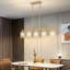 Luminaire suspendu pour îlot de cuisine à 5 lumières de 36 po de large avec détails en cristal Kamaren-2054146429
