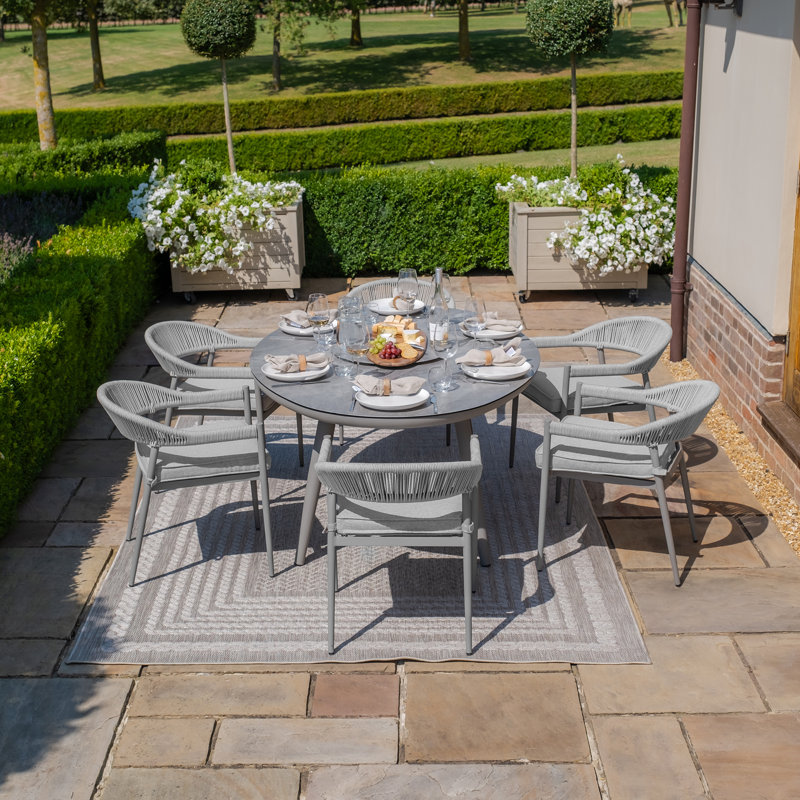 Anduin 6 - Person Patio Dining Set with Oval Table