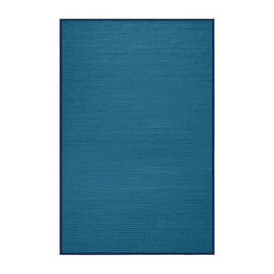 Tapis bleu uni lavable à la machine