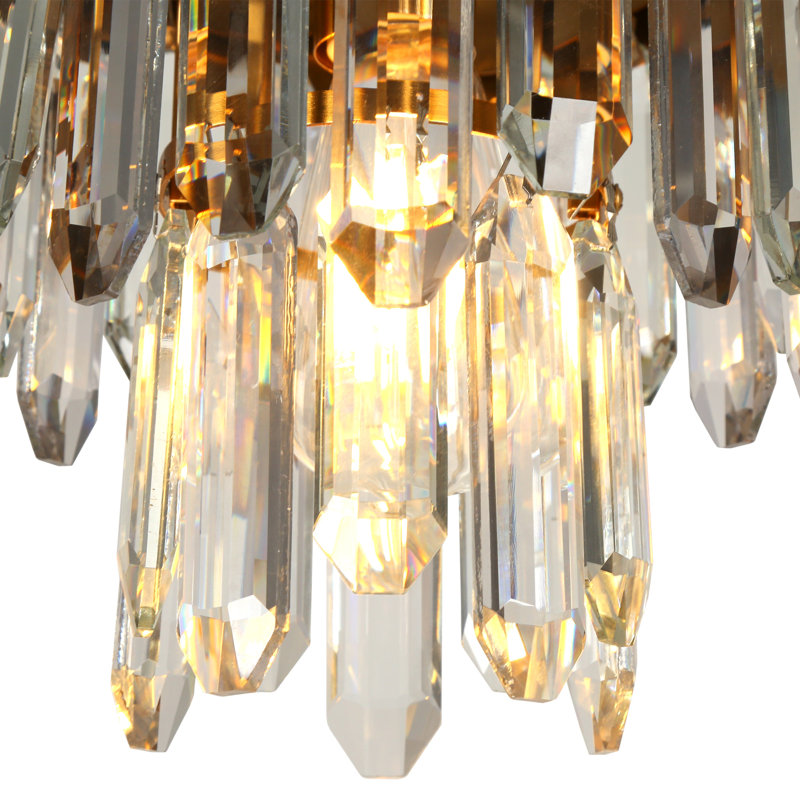 Suspension Grigor à une lumière en cristal, style moderne noir et laiton, à intensité variable, idéale pour îlot de cuisine.
