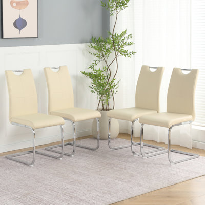 Ensemble de 4 chaises de salle à manger en polyuréthane jaune pour diverses utilisations, pieds en métal électroplaqué, conception ergonomique pour une meilleure répartition du confort et une réduction de la fatigue, surface d'assise imperméable et facile à nettoyer, rembourrage en mousse fraîche.