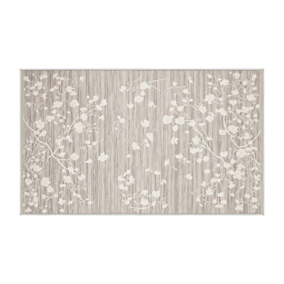 Tapis beige lavable à la machine