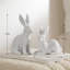 Ensemble de 2 figurines de lapin en résine givrées blanches