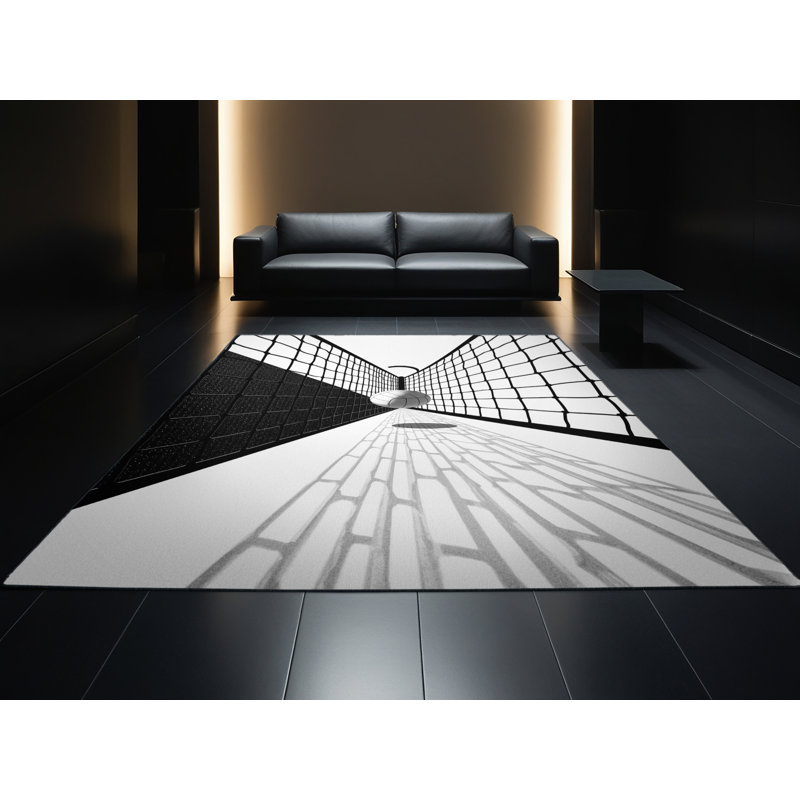 Tapis géométrique moderne et contemporain en filet gris et noir lavable à la machine Takengon, 5x7