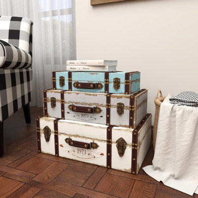 Multi Colored Wooden Nesting Decorative Trunk with Vintage Accents and Studs, Set of 3