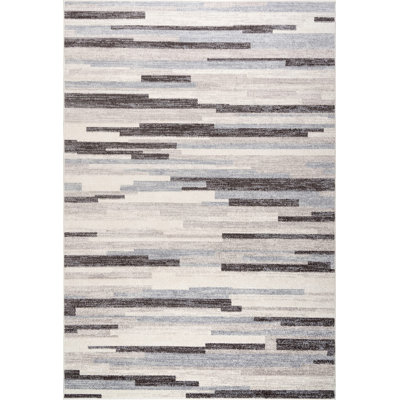 Tapis abstrait crème / beige