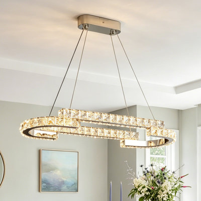 Suspension linéaire DEL tricolore à intensité variable, lustre ovale moderne en cristal K9 — un luminaire de luxe pour les îlots de cuisine et les salles à manger.