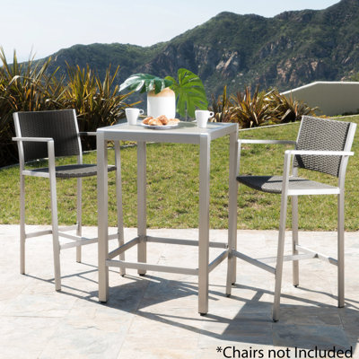 Table de bar d'extérieur grise avec structure en aluminium et plateau en verre