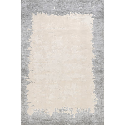 Mera Bordered Wool Area Rug