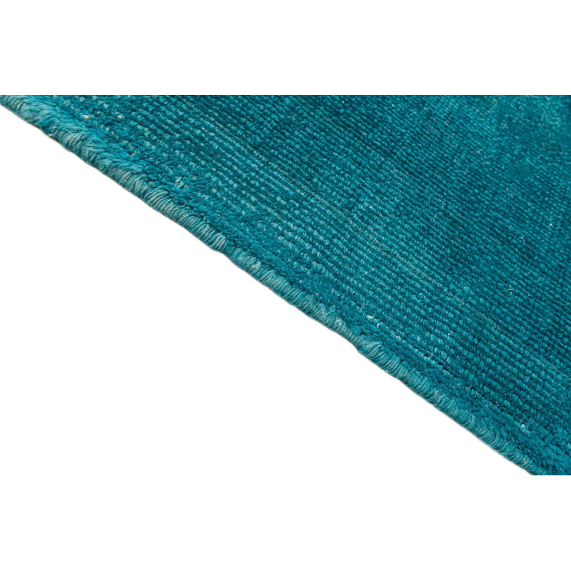 Tapis carré bleu sarcelle Kalmanovitz