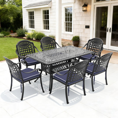 Ensemble de 7 meubles de jardin en aluminium moulé, structure noire, coussins bleus, fabrication traditionnelle, lignes raffinées, grande résistance, design d'espace
