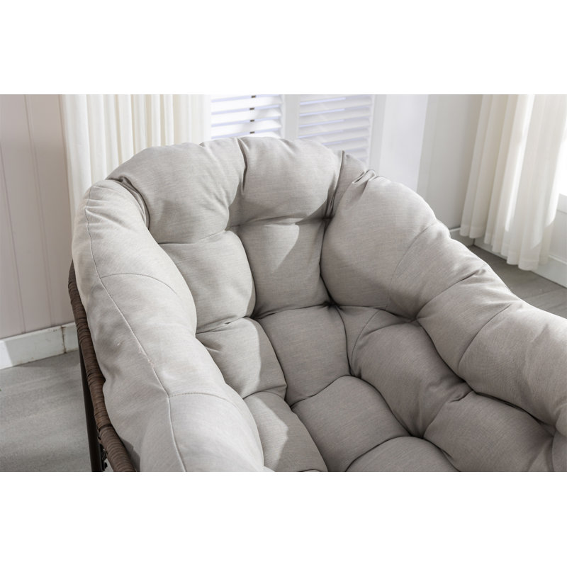 Chaise berçante d'extérieur en rotin