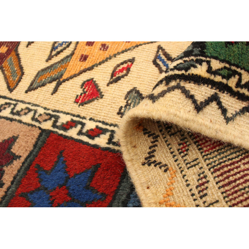 Tapis ivoire en laine noué à la main