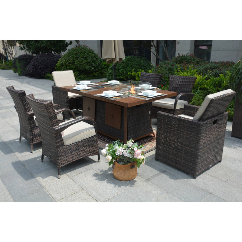 Betzaira 6 - Person Wicker Patio Dining Set with Rectangular Table , Cushions Included
