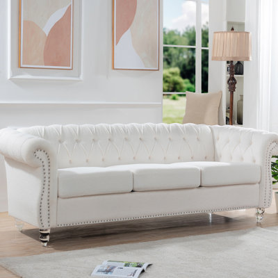 82.24" White Rolled Arm 3 Person . Adheres To Us Tb117. Staggered Deep Pull Buckles For Even Stress Distribution. Birch Legs With Paint Seal Easy Stain Elimination. Solid Wood + Plywood Interior.