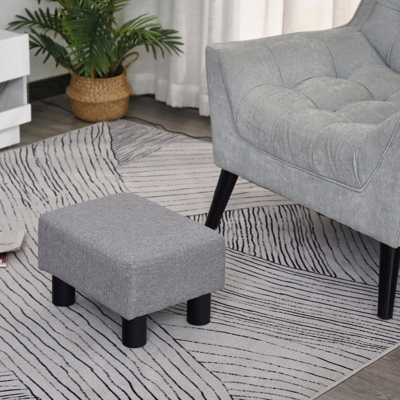 Petit repose-pieds rembourré en tissu de lin, forme cubique avec pieds en plastique