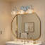 Éclairage pour meuble-lavabo en métal et chrome 3 lumières 18 po avec abat-jour en verre transparent pour salle de bain (ampoules non incluses)-118588136-109616271